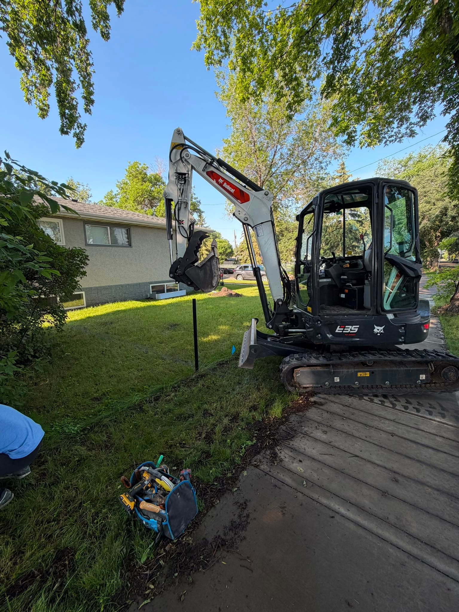 Bobcat E35 mini excavator on a residential excavation in Edmonton